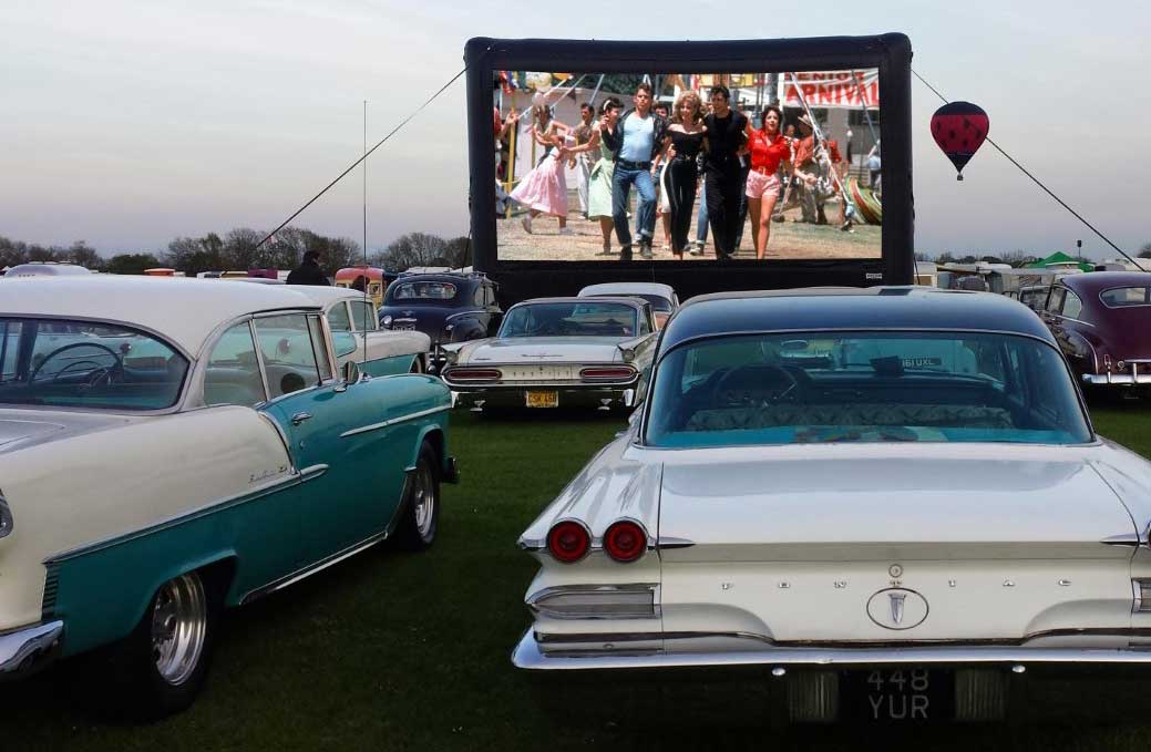 grease showing at a drive-in cinema
