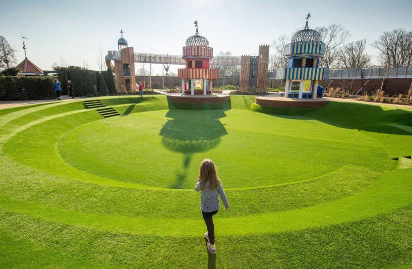 Girl enjoying the outdoors at Hampton Court's Magic Garden.