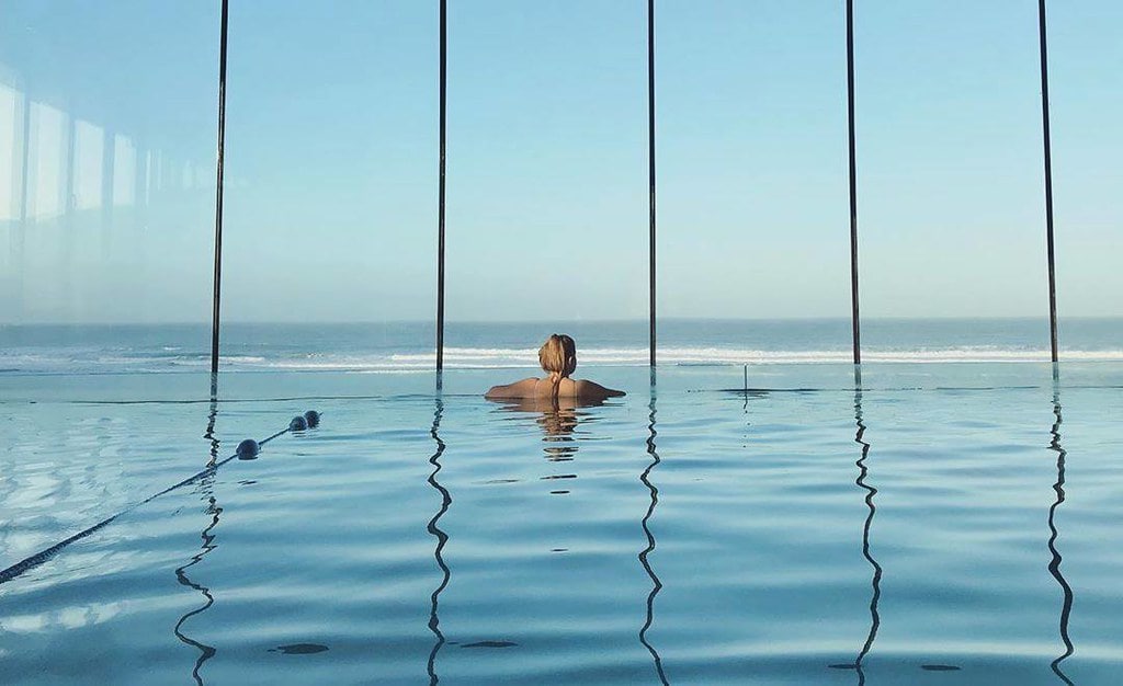 Infinity pool with a view overlooking the sea at Watergate Bay, Cornwall.