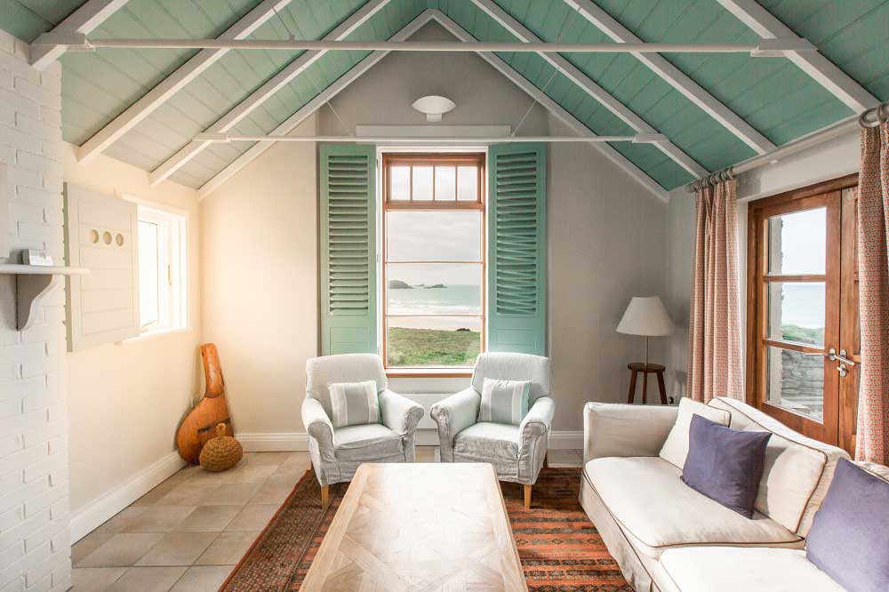 Seaside decor in the seating area of a room at The Headland.