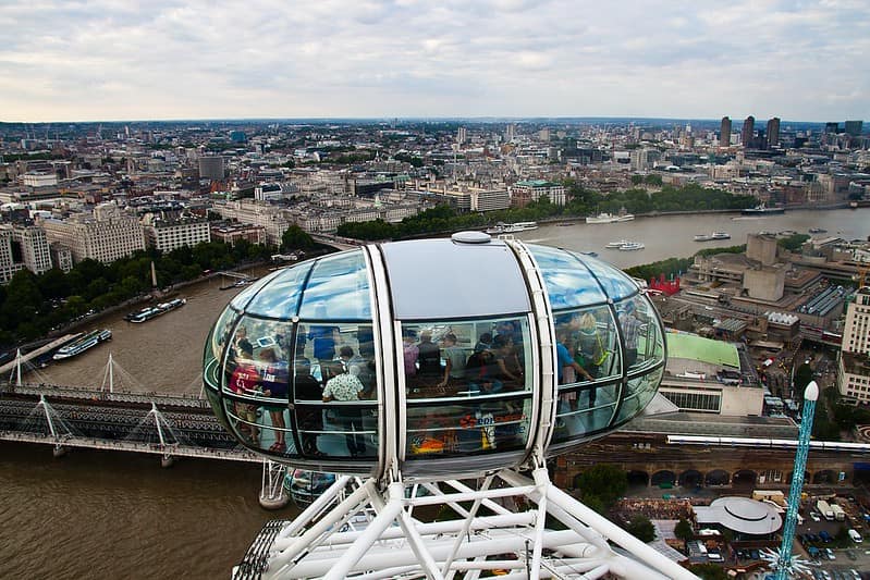 The pods on the London Eye with a view over the River Thames and the city.