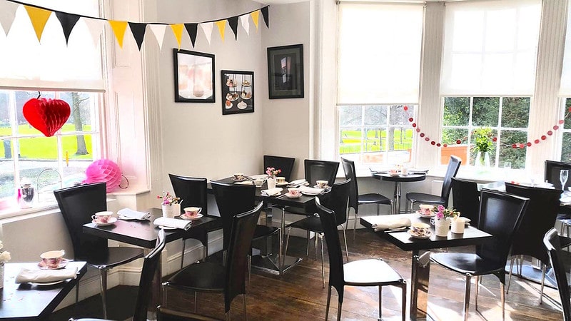 Afternoon tea at The Dining Room with bunting decorations.