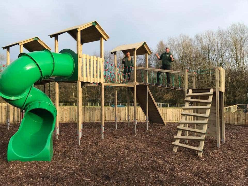 Children's playground with climbing frame and slide.