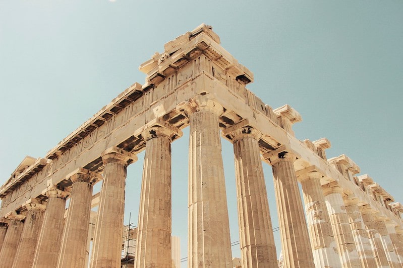 Roman ruins, a grand structure with columns showcasing Roman architecture.