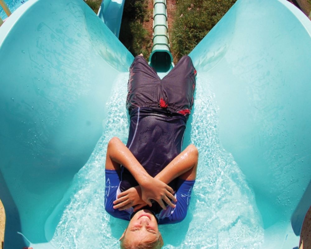 Child prepares to drop down Devil's Drop, one of the more intense Splashdown slides.