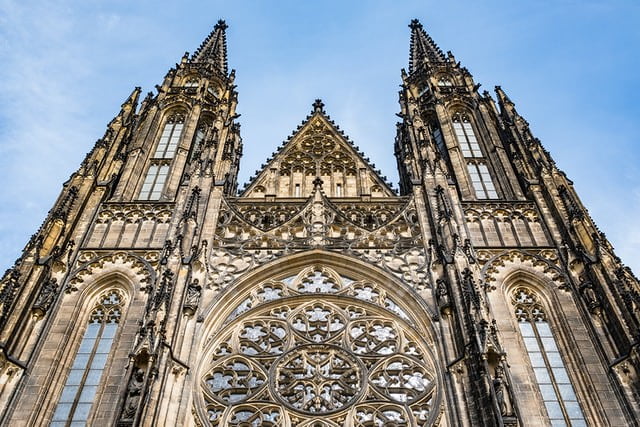 The front facade of a gothic style church.