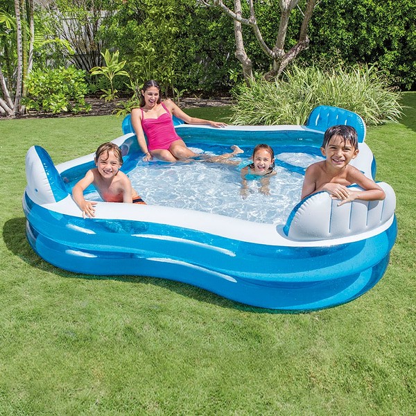 Family lounging in Intex Family Lounge Pool.