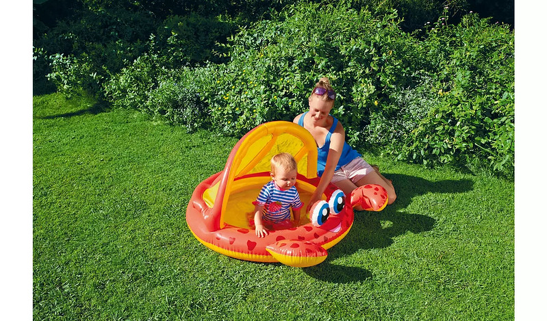 Mum and baby playing in Chad Valley Crab Baby Pool.