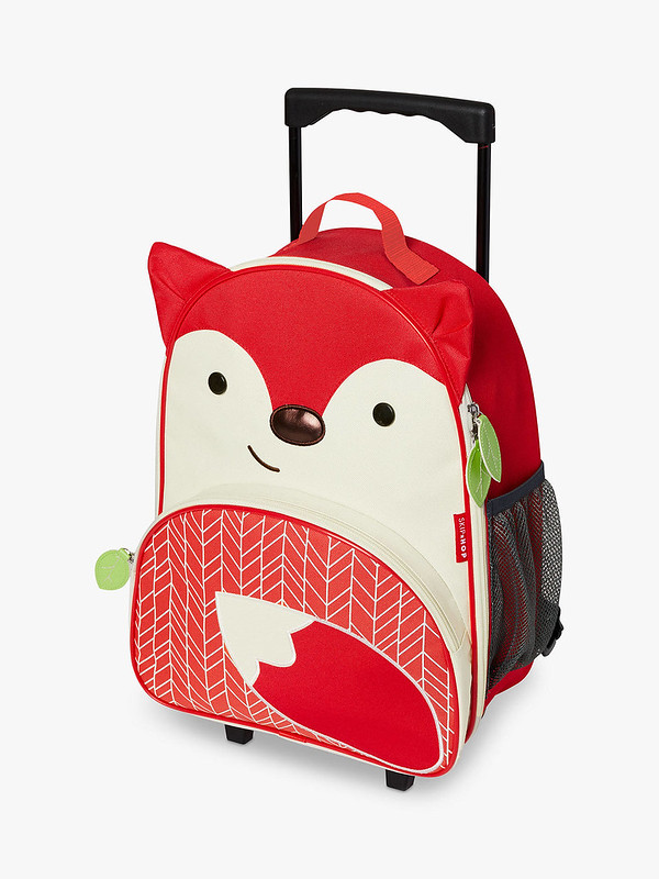 A Skip Hop Zoo wheelie suitcase with the design of a red fox.