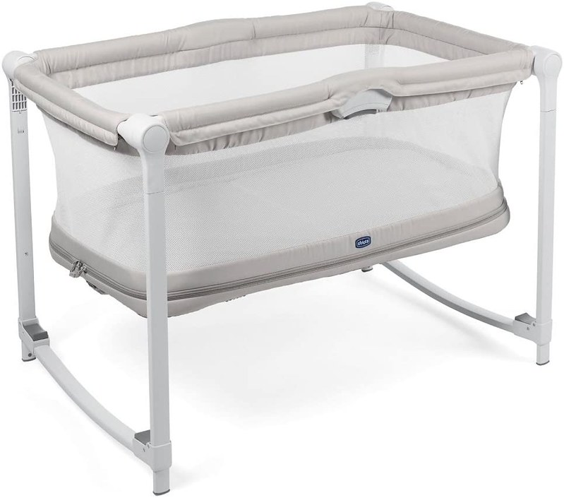 White and beige Chicco Zip And Go Travel Cot.