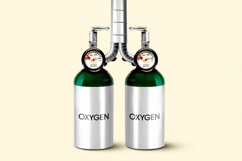 Two oxygen tanks feeding into the same pipe, resembling human lungs.