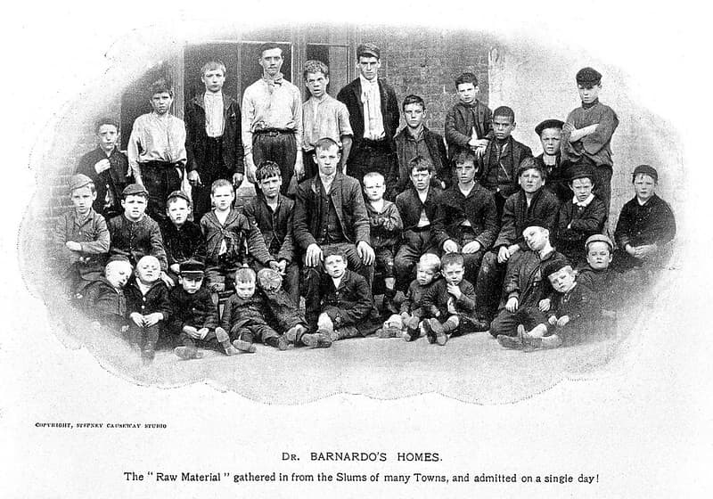 Black and white photograph of young boys outside a boys' Dr Barnardo's home.