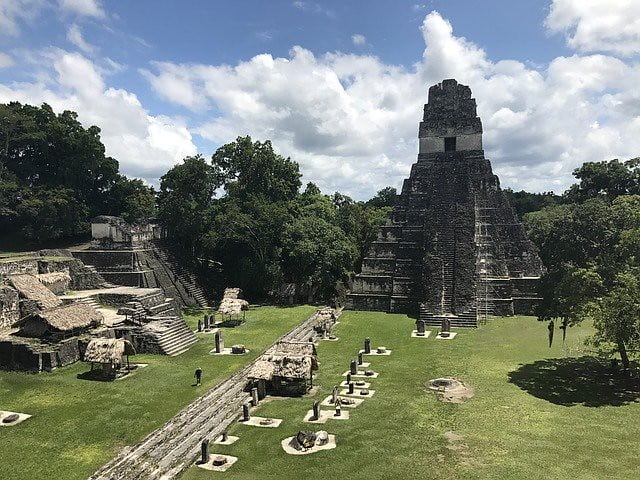 Tikal, a famous Mayan city, with a main pyramid structure.