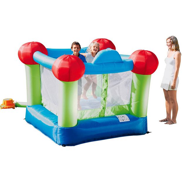 Children playing on Chad Valley 6ft Bouncy Castle while mum watches.