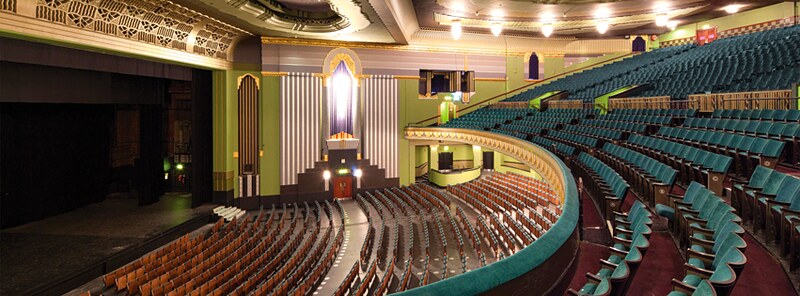 The auditorium and the edge of the stage of the Event Apollo.