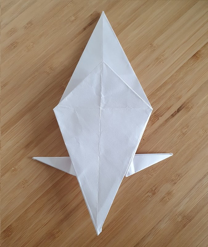 Step 5 to making an origami crow.