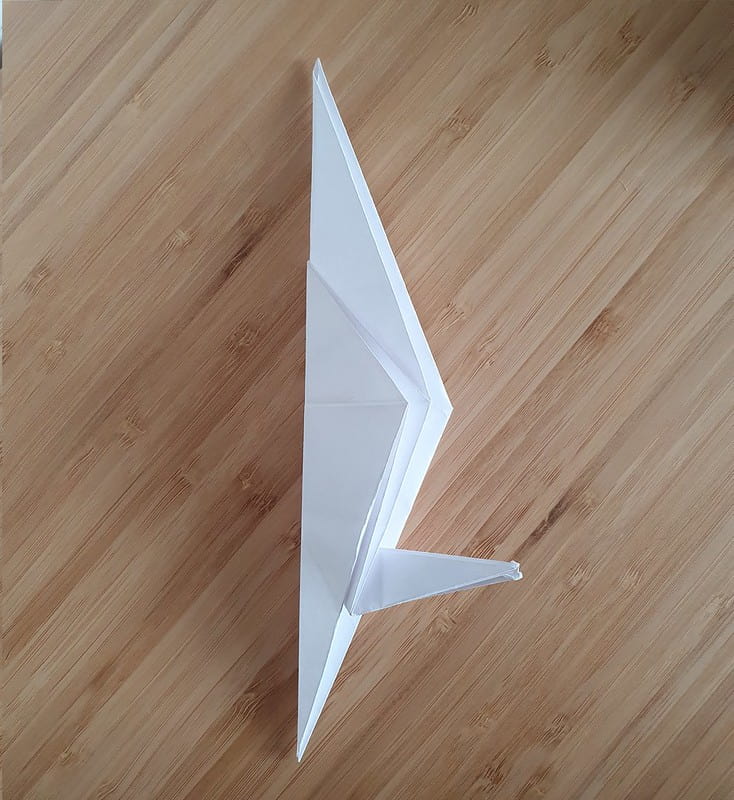 Step 6 to making an origami crow.