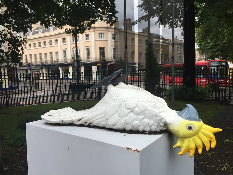 Dead parrot statue in Greenwich.