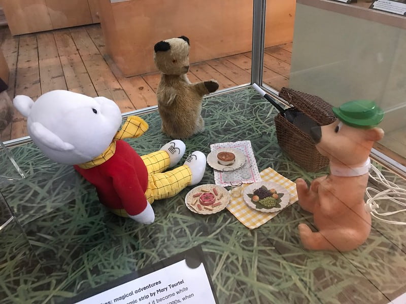 Museum display of the ultimate teddy bear's picnic.
