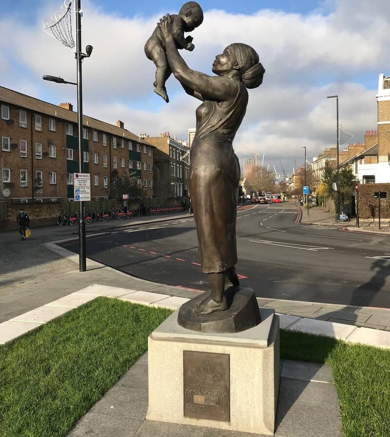 Statue of a Jamaican woman and child.