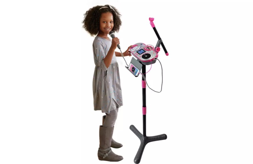 Girl playing as a superstar DJ.