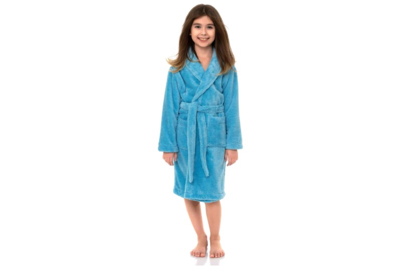 Little girl wearing blue kids bathrobe.
