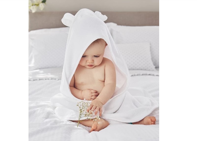 Extremely soft and fluffy hooded bath towel.