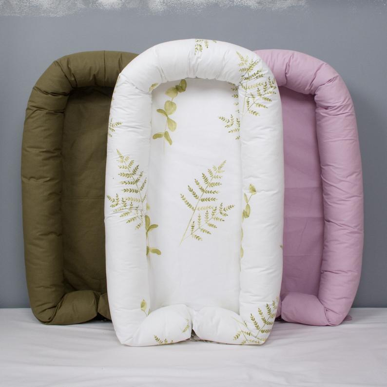 Beautiful and comfortable different colors pod or nest for newborn and toddler.