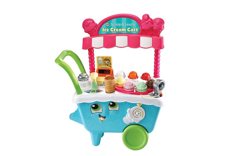 Cute and fabulous pink ice cream cart with different colorful scoop toys.