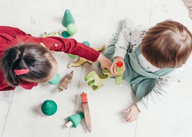Italian siblings happily playing together.