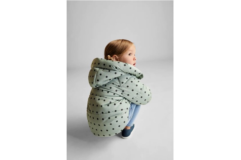 Green with polka dots design hooded puffer jacket fit for fashion style.