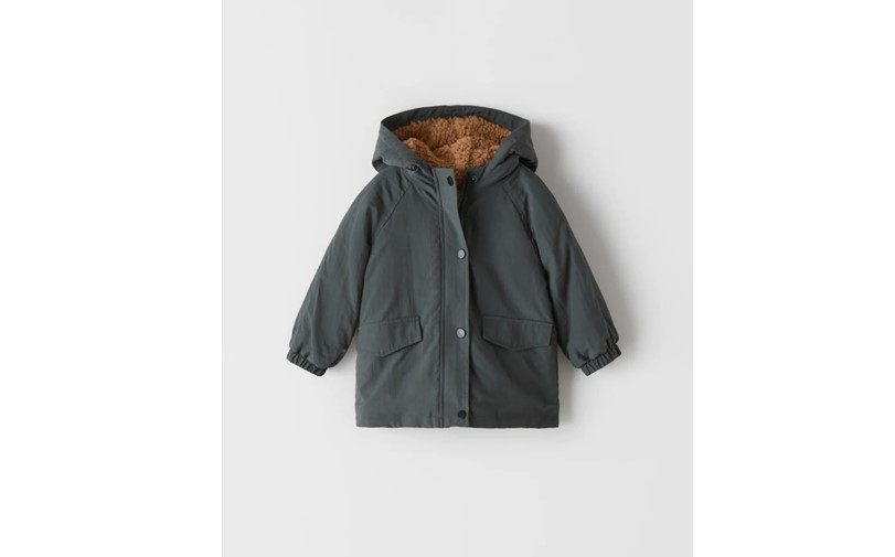 Anthracite grey parka hooded coat with two pockets, and button zipper lock.