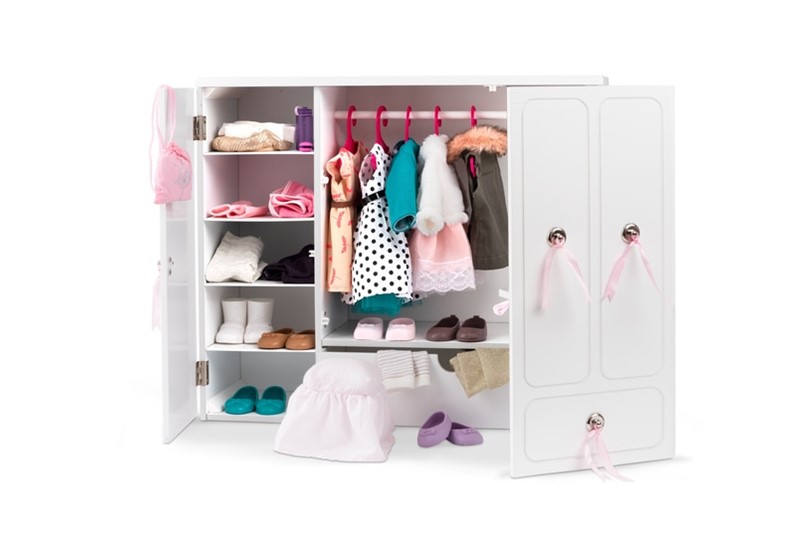 Elegant and spacious white wooden doll wardrobe with vanity mirror that makes it ore classy.