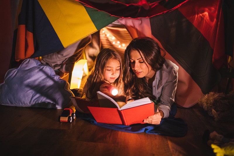 Setting up an indoor cosy den can be a different and fun way to get snug indoors.