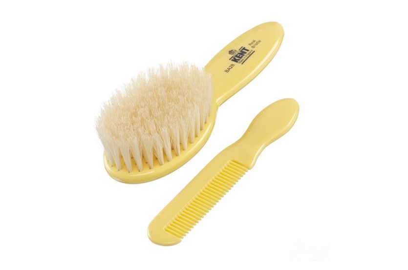 Set of cute baby's hair brush and comb with soft pure white bristle.