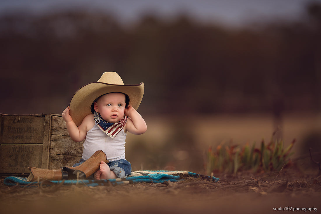 Boy with cowboy hat