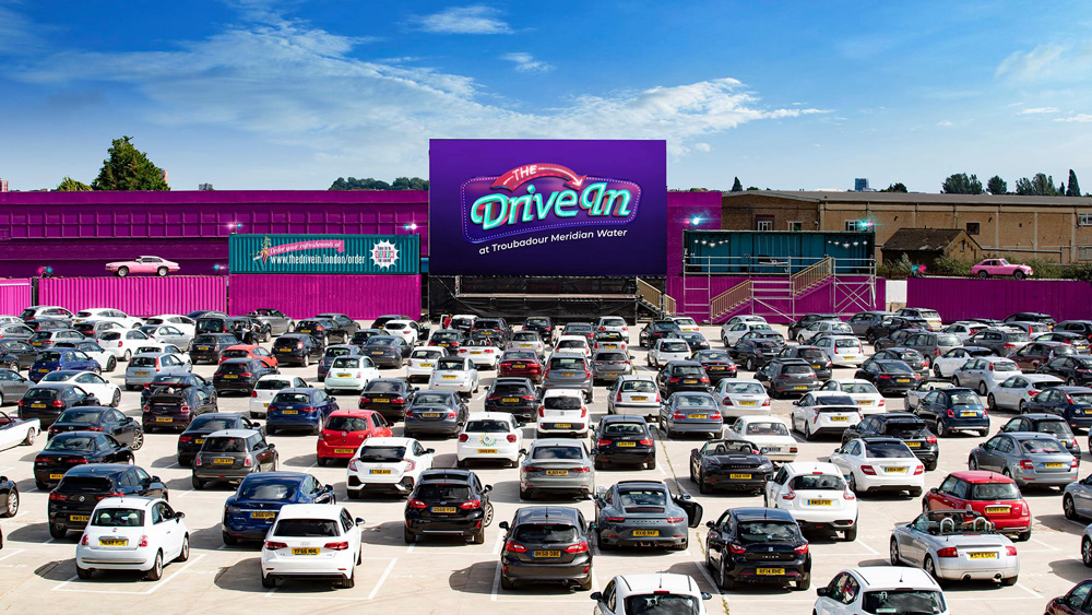 Rows of cars parked up ready to watch a film at The Drive In.