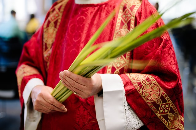 Red vestements are worn on Palm Sunday.