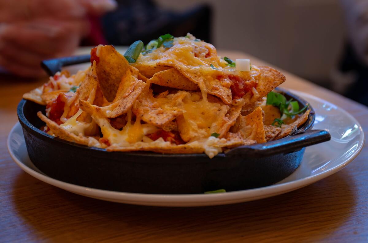 Nachos are great with cheese and a lot of fun.