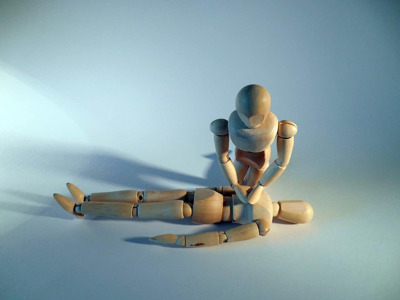To perform CPR correctly, place one hand on top of the other with the heel of the bottom hand on the center of the chest.