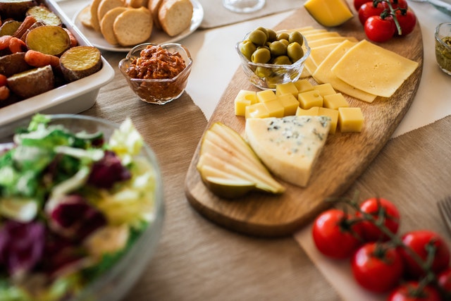 Cracking a cheese joke while serving food is quite fun.