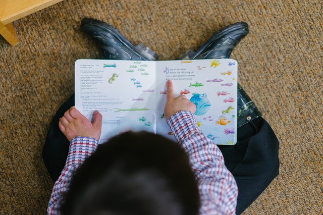 A quiet activity like reading a book can be a perfect substitute for the morning nap.