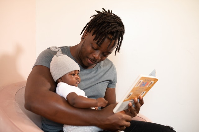 Playing with and cuddling your baby will help ensure they meet developmental targets.