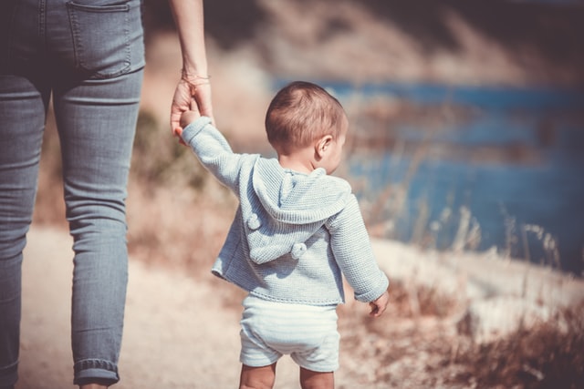 Walking is on the 14-month-old milestones checklist, but don't worry if your toddler isn't quite there yet.