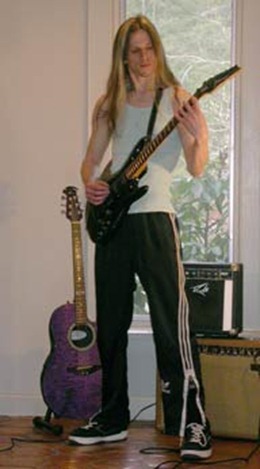 Guitare électrique debout position intermédiaire