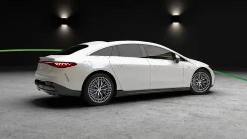 Mercedes-Benz EQS parked in dark room with gray floor