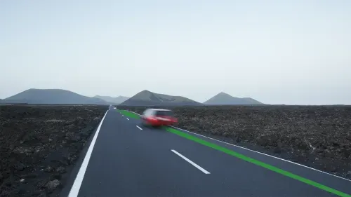 red car driving with green motion line