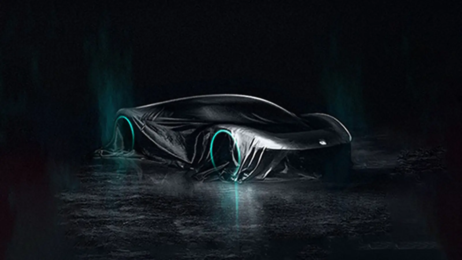 Dark room, car under tarp with glowing wheels