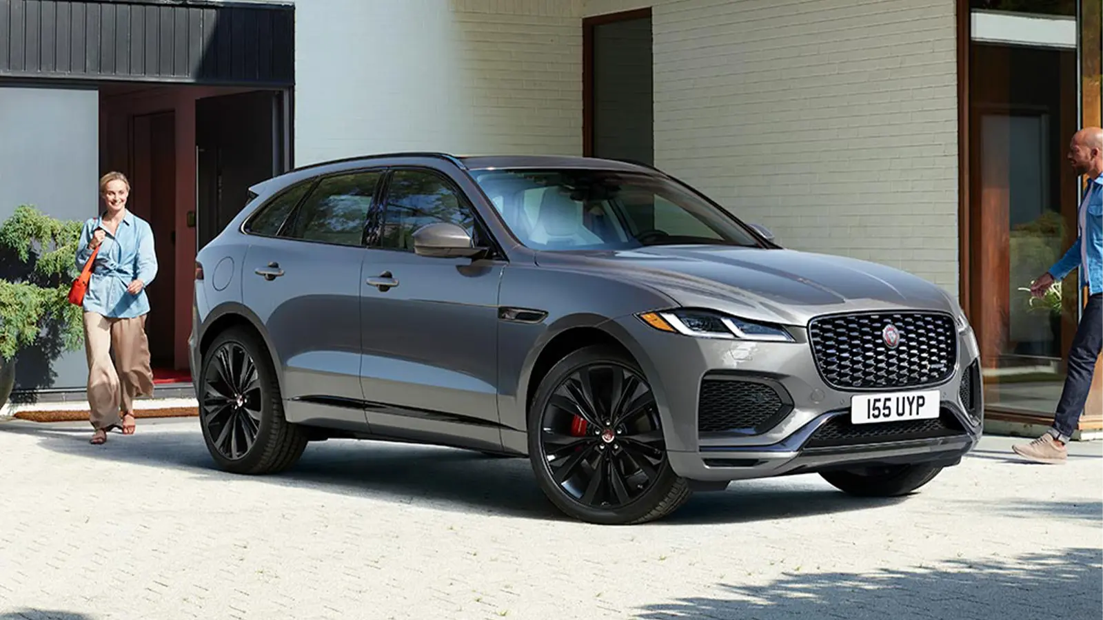 JAGUAR F PACE WITH COUPLE ABOUT TO GO FOR A RIDE