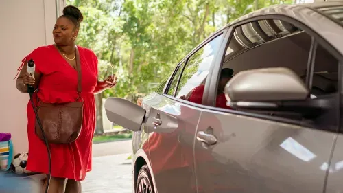Woman charging car